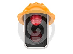 Red traffic light with hardhat