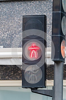 Red traffic light for pedestrians on the street in Andorra