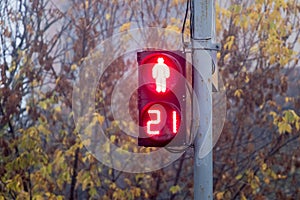 A red traffic light prohibits pedestrian traffic