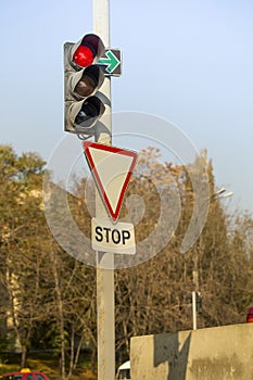 Red traffic light, Stop sign at intersection