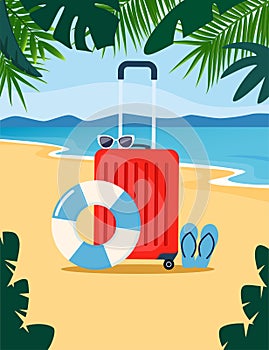 Red travel suitcase on tropical beach. Sunglasses, inflatable circle, rubber beach slippers. Travel concept. Summer vacation.