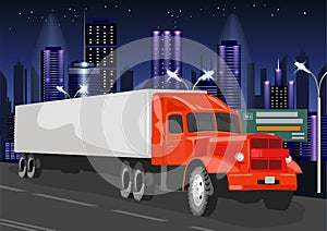 Red truck with white cargo container goes through night city