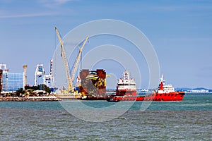 Red tugboats at the harbor