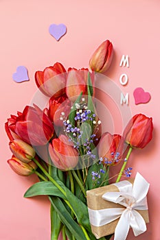 Red tulips with gift box and small hearts, \