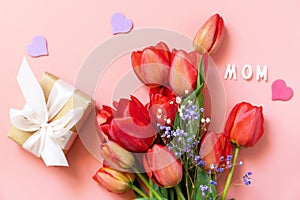 Red tulips with gift box and small hearts, \