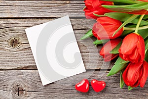 Red tulips and Valentine`s day greeting card