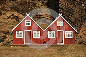 Red turf covered double house, Iceland