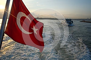 Red Turkish flagon the ferry boat