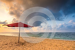 Red Umbrella on a beach