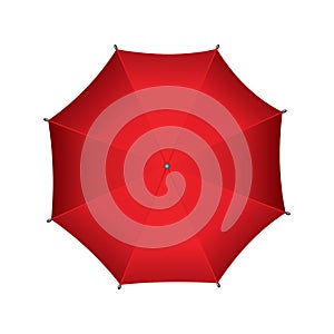 Red umbrella. Isolated on white background. Parasol in top view. Hand-held rain or windbreak protection photo