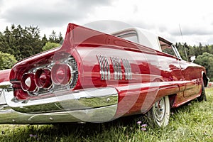 Red US vintage car, rear view