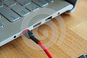 The red usb type c is a hi speed data transfer port