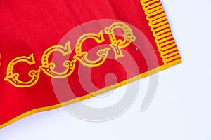Red ussr flag on a stick on an isolated white background since soviet times