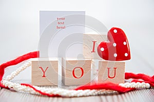 Red valentine heart, with wood background