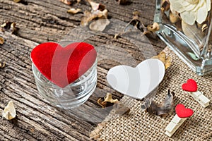 Red Valentines hearts on old rustic wooden background