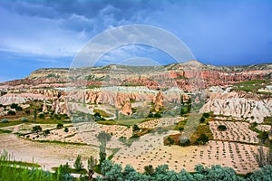 Red valley at Cappadocia, Anatolia, Turkey. Volcanic mountains i
