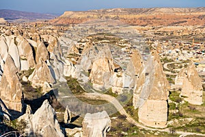 Red Valley and Rose Valley under the sunlight in daytime in Cappadocia, Turkey. Rock formations that changes color from rose to