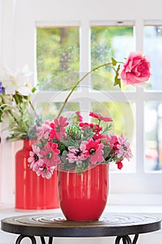 Red vase flower