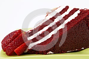 Red Velvet Cake Garnished with Strawberries photo