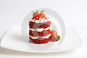 Red velvet cake isolated on white.