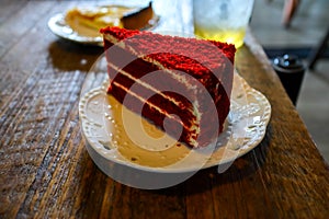 Red velvet cake in white plate.