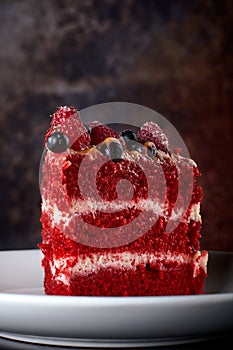 Red velvet cake on wood board. Slice of cake. Raspberry cake. Devil`s cake. Wedding dessert.Delicious dessert