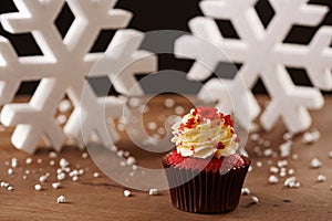 Red velvet cupcake on Christmas background