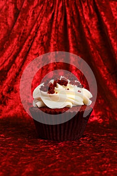Red Velvet Cupcake on Red Velvet Background