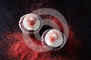 Red velvet cupcakes with candy sprinkles