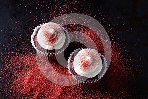 Red velvet cupcakes with candy sprinkles photo
