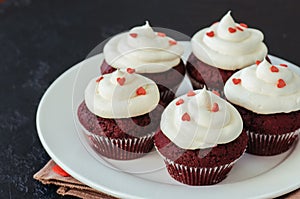 Red velvet cupcakes with cream cheese frosting