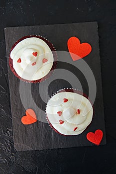 Red velvet cupcakes with cream cheese frosting