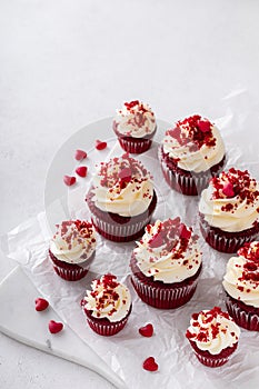 Red velvet cupcakes with cream cheese frosting for Valentines day