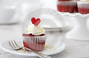 Red velvet cupcakes with red heart for Valentine`s day