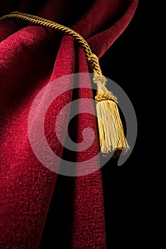 Red velvet curtain with tassel