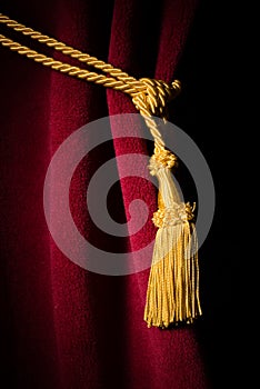 Red velvet curtain with tassel