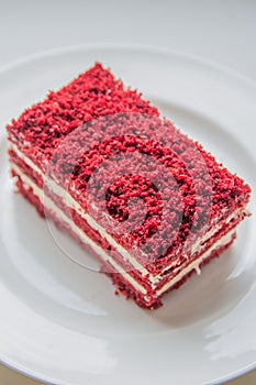 red velvet slice of cake on white plate