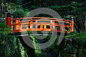 Red Vermillion bridge in a forest in Japan