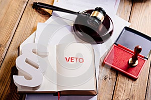 Red veto stamp in notepad