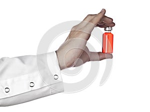 Red vial on a hand photo
