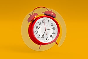 Red vintage alarm clock on bright orange color background. Time management, deadline concept. 3d rendering