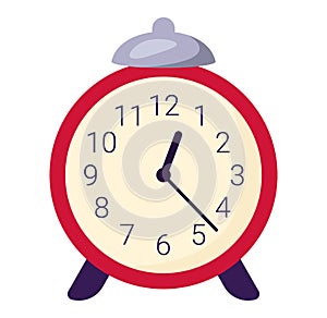 Red vintage alarm clock showing seven oclock. Classic analog timepiece bells legs. Time management photo