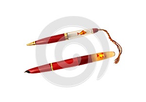 Red vintage Fountain Pen and ballpoint pen isolated on white bac