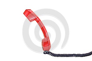 Red vintage telephone receiver with a black cable isolated on white background. Space for your text.