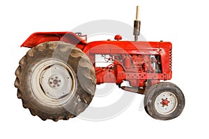 Red vintage tractor isolated on white background.