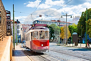 Red vintage tram on the street in Lisbon, Portugal