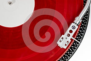Red vinyl record on the player