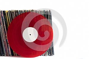 Red vinyl records on a white background