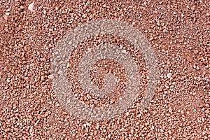 Red volcanic stones soil texture in National Park of Timanfaya - Lanzarote - Spain