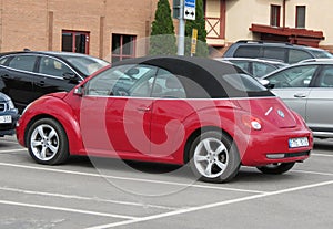 Red Volkswagen New Beetle cabrio
